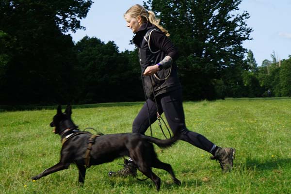 Photograph of Dog Tr ainer Lisa from Nimbus Dogs with her dog Magik