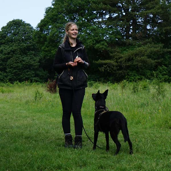 Photograph of Lisa, dog and puppy training Magik , a Dutch Shepherd