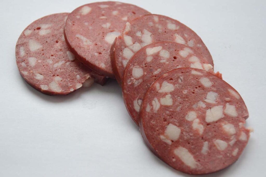 Photograph of sausage slices as an example of dog training treats.